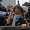 A protester is tackled by riot police during a massive demonstration outside the Legislative Council in Hong Kong, June 12, 2019.