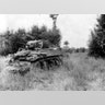 Rhino Tank - Another modification for tanks came not from Major-General Hobart but from American, Sergeant Curtis G. Culin, who developed a type of metal sawtooth that could be fitted to the front of a tank. Made of little more than scrap steel this allowed the Allies to break through the heavy “bocage,” or hedgerows in Normandy. The teeth helped prevent the vulnerable underside of the tank from being exposed to enemy fire when it cut through the bocage. It was soon dubbed the Culin Rhino device or Culin hedgerow cutter. This photo shows an American M5 "Stuart" light tank with a Rhino cutter in Normandy in 1944.