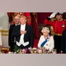 President Trump and Queen Elizabeth II standing at the banquet.