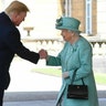 Britain's Queen Elizabeth II greeting President Trump as he arrived for the welcome ceremony in the garden of Buckingham Palace.