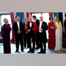 White House Director of Social Media Daniel Scavino Jr., second from left, National Security Advisor John Bolton, White House aide Stephen Miller, third from right, White House Press Secretary Sarah Sanders, second from right, and other White House staff.?