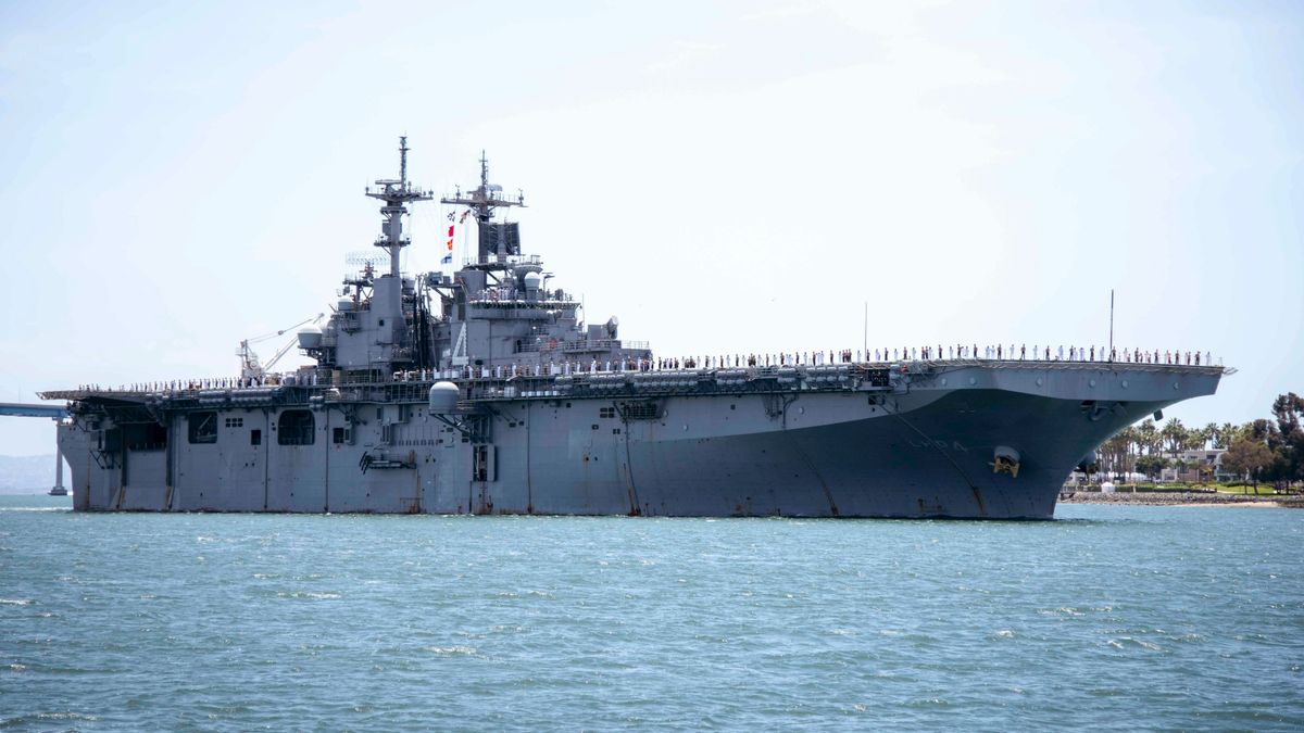 File photo - In this May 1, 2019, photo provided by the U.S. Navy, the amphibious assault ship USS Boxer (LHD 4) transits the San Diego Bay in San Diego, Calif. President Donald Trump says the USS Boxer destroyed an Iranian drone in the Strait of Hormuz amid heightened tensions between the two countries. Trump says it's the latest "hostile" action by Iran.