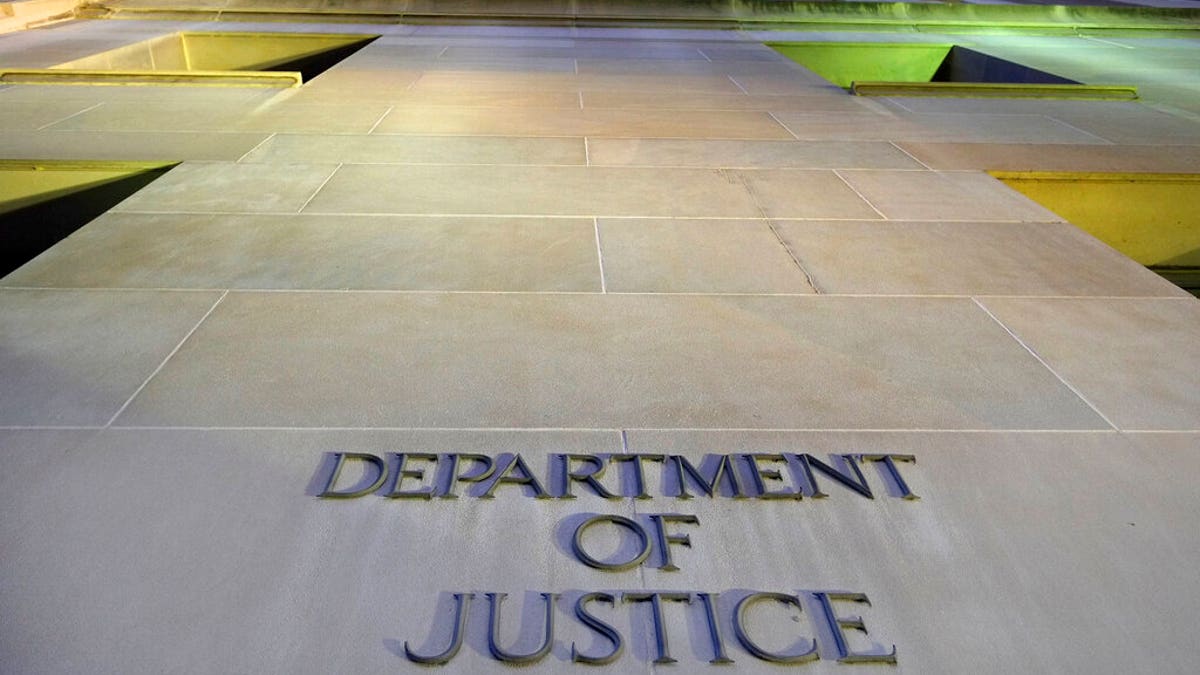 FILE: The Department of Justice headquarters building in Washington early in the morning.