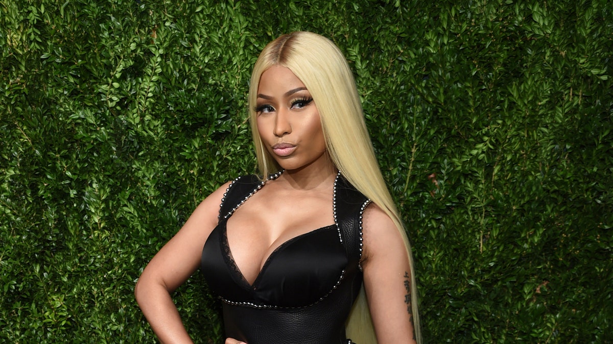 FILE - This Nov. 6, 2017 file photo shows Nicki Minaj at the 14th Annual CFDA Vogue Fashion Fund Gala in New York. Minaj is pulling out a concert in Saudi Arabia because she says she wants to show support for women’s rights, gay rights and freedom of expression. She was originally scheduled to headline the concert on July 18, 2019. The Human Rights Foundation issued a statement last week, calling for Minaj and other performers to pull out of the show.