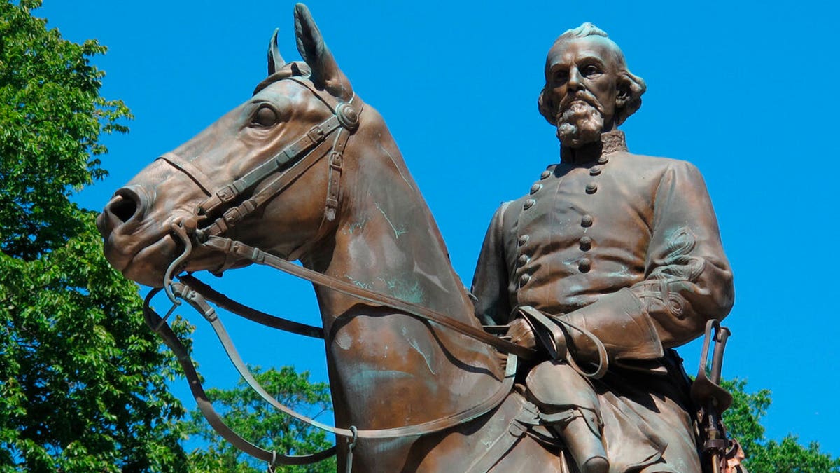 FILE - In this Aug. 18, 2017, file photo, a statue of Confederate Gen. Nathan Bedford Forrest sits in a park in Memphis, Tenn.