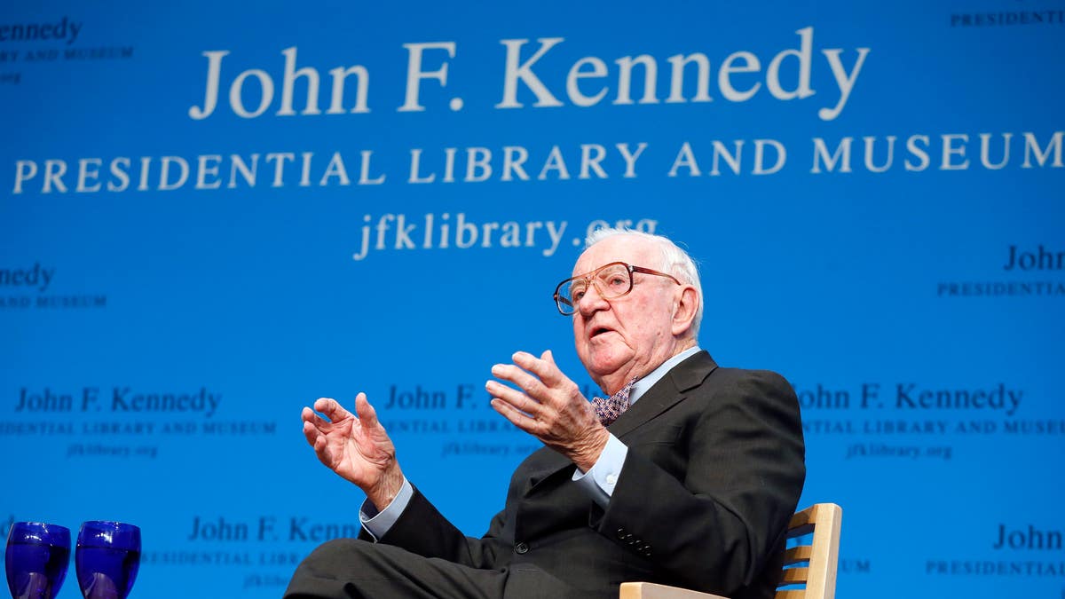 Retired U.S. Supreme Court Justice John Paul Stevens talking about his views and career during a forum at the John F. Kennedy Library in Boston, in 2013. (AP Photo/Michael Dwyer, File)
