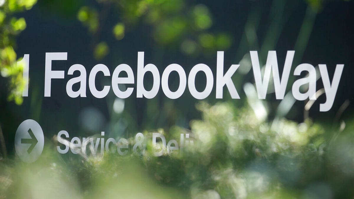 FILE: An address sign for Facebook Way is shown in Menlo Park, Calif. 
