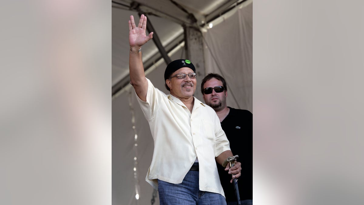 This May 4, 2008, photo shows Art Neville during the New Orleans Jazz and Heritage Festival in New Orleans. 