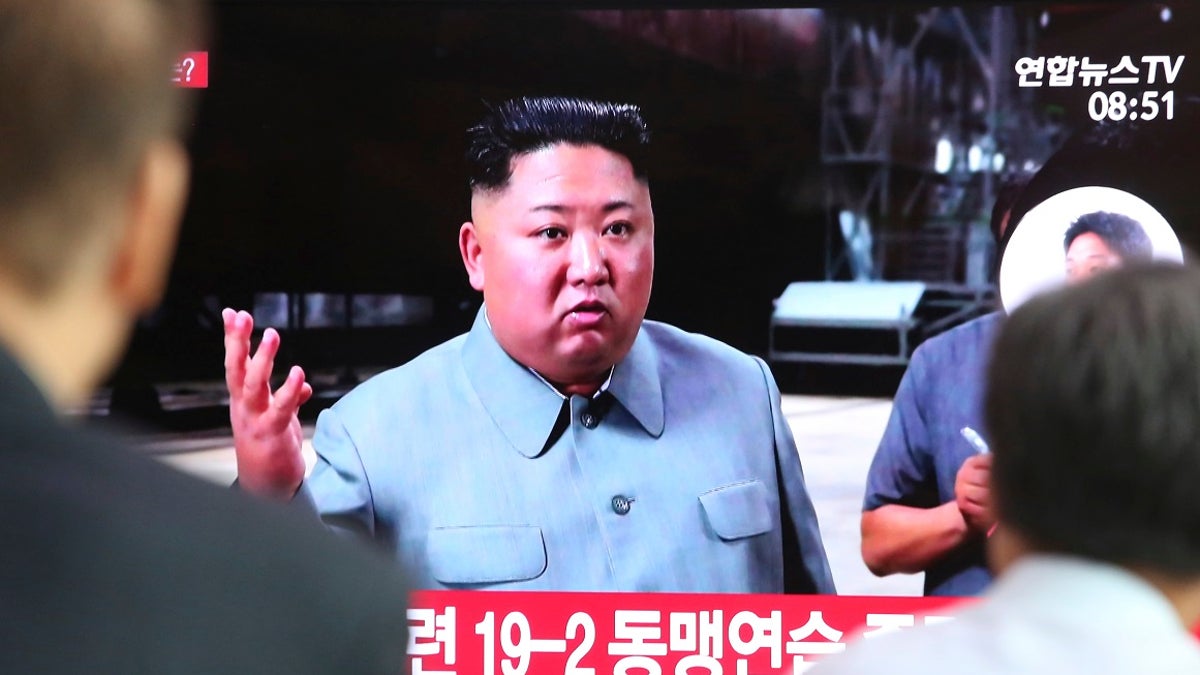 People watching a TV showing a file image of North Korean leader Kim Jong Un during a news program at the Seoul Railway Station in Seoul, South Korea, Thursday. (AP Photo/Ahn Young-joon)