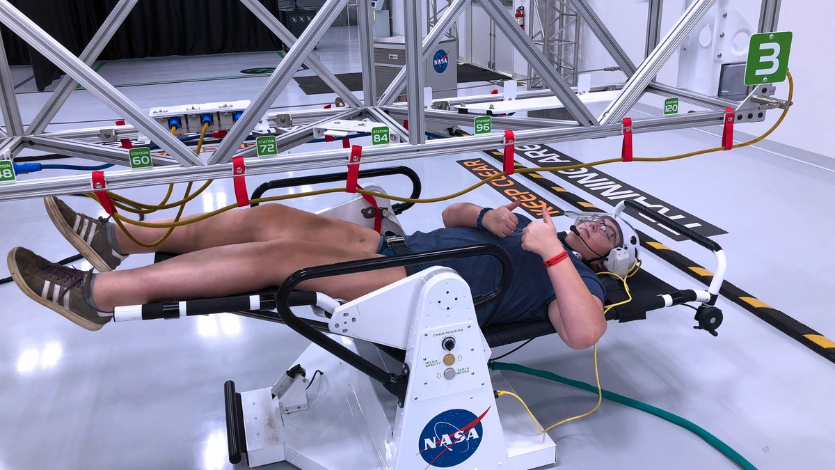 Microgravity "space walk" during the astronaut training experience at Kennedy Space Center. (Photo by Dave Parfitt)