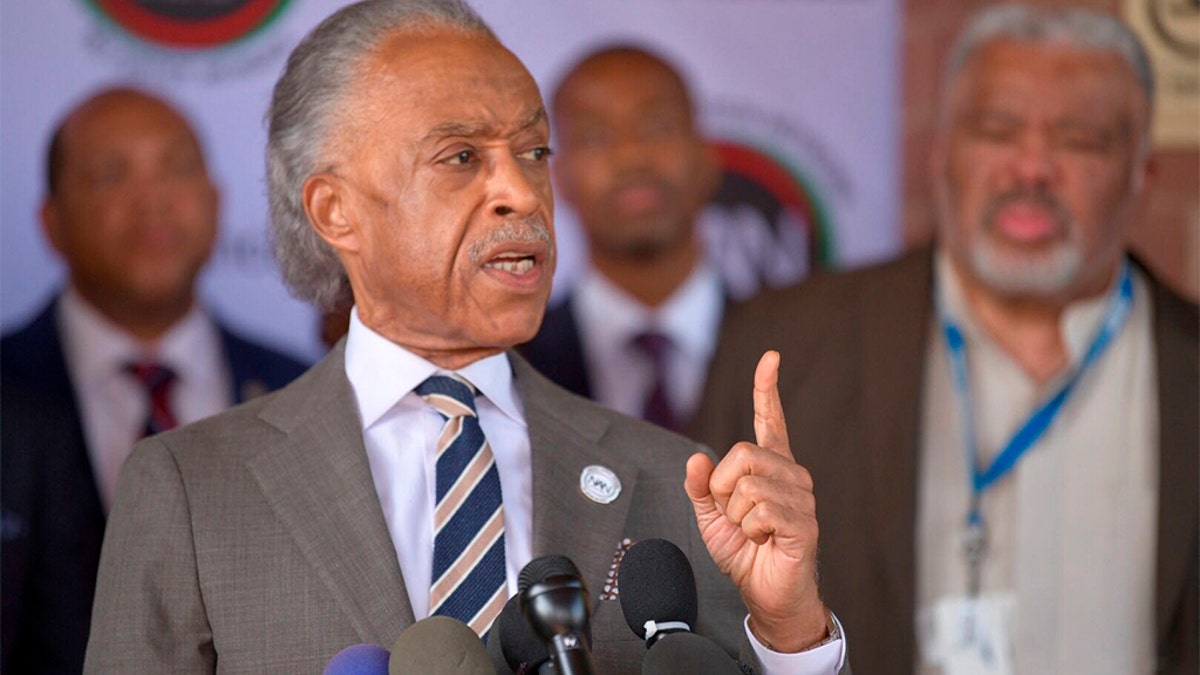 The Rev. Al Sharpton speaks during a press conference at New Shiloh Baptist Church in Baltimore last in July. (Jerry Jackson/The Baltimore Sun via AP)
