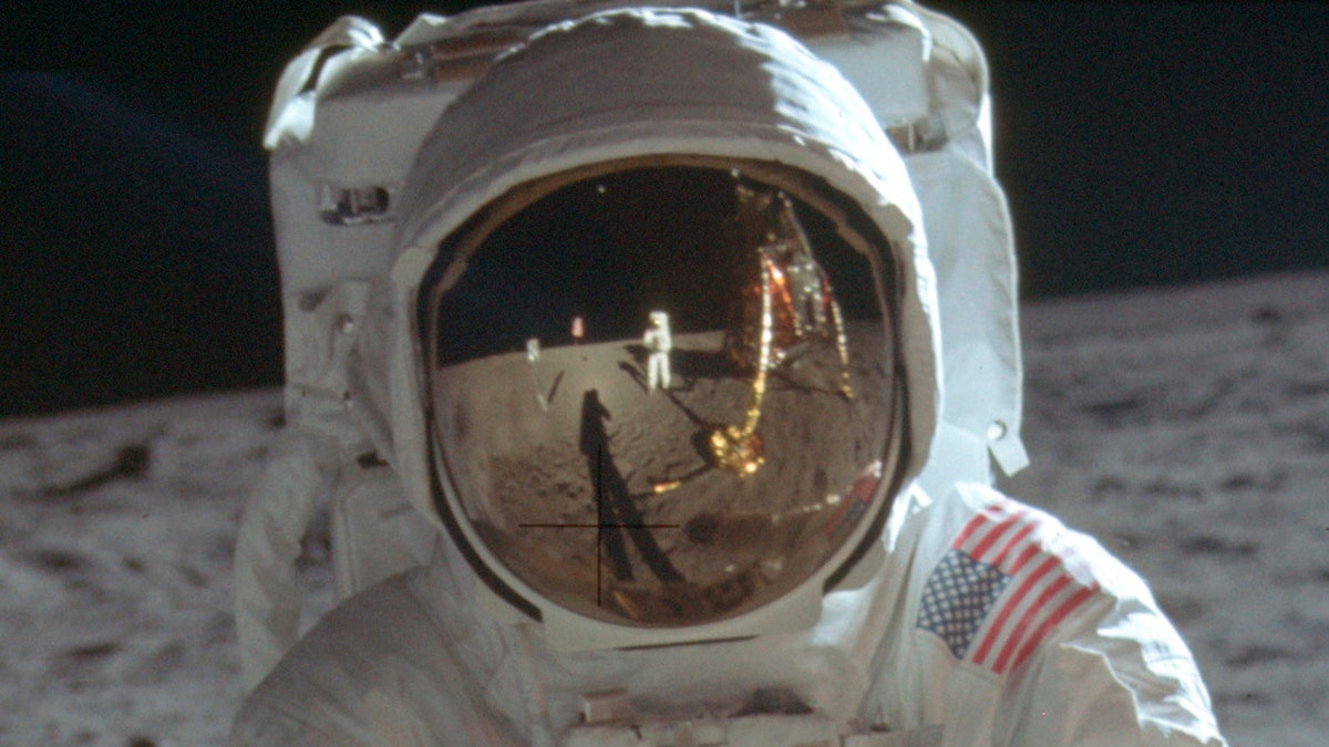 This detail of a July 20, 1969 photo made available by NASA shows astronaut Neil Armstrong reflected in the helmet visor of Buzz Aldrin on the surface of the moon. The astronauts had a camera mounted to the front of their suits, according to the Universities Space Research Association. So rather than holding the camera up to his eye, as we're accustomed to, Armstrong would have taken the photos from near his chest, which is where Armstrong's hands appear to be in his reflection.