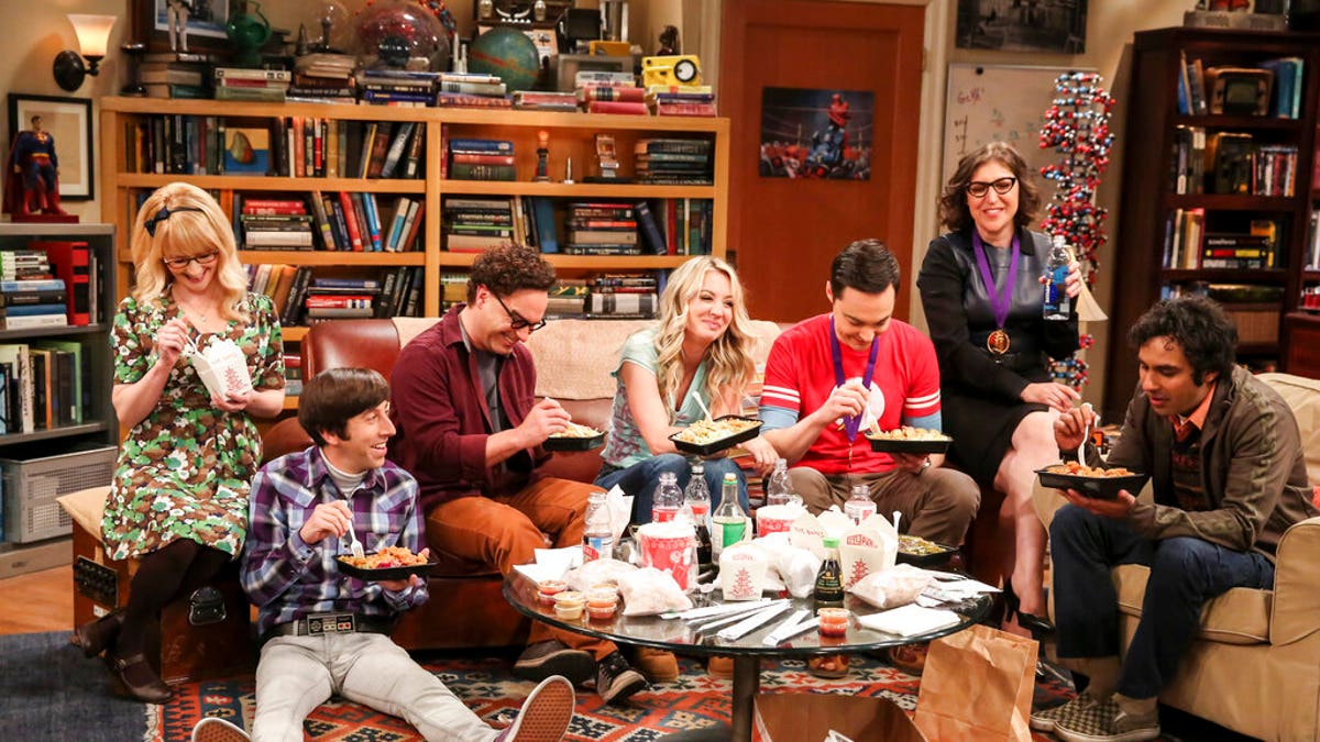 This photo provided by CBS shows Melissa Rauch, from left, Simon Helberg, Johnny Galecki, Kaley Cuoco, Jim Parsons, Mayim Bialik and Kunal Nayyar in a scene from the series finale of 