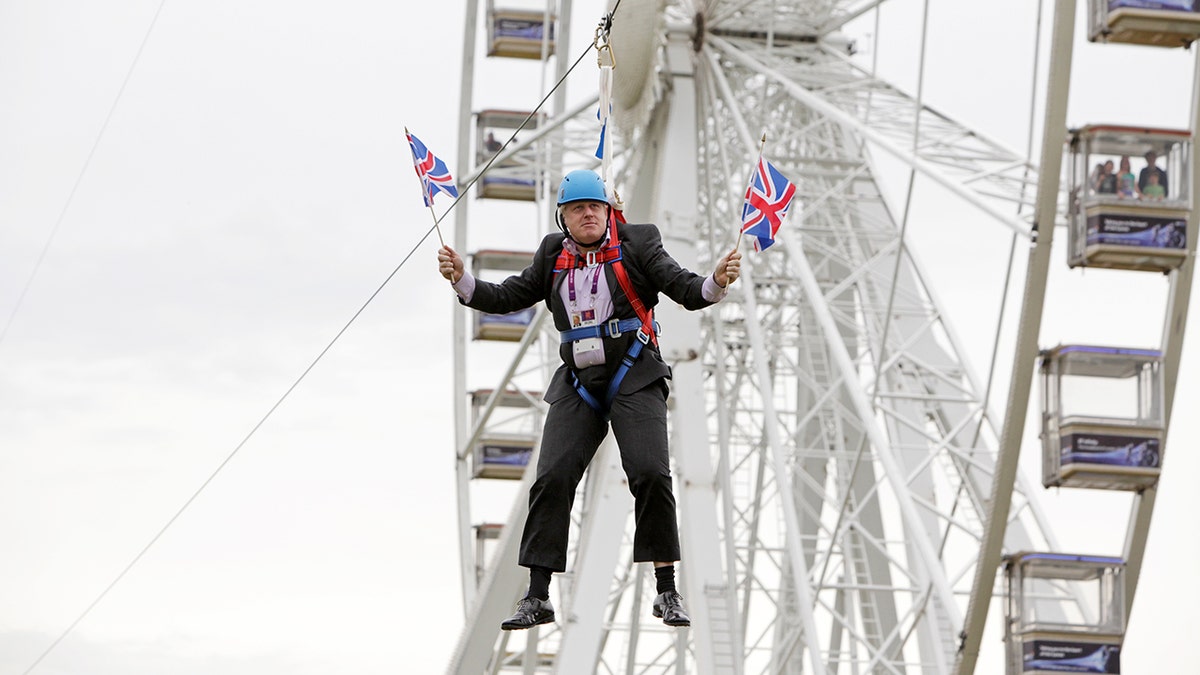 Mayor of London Boris Johnson got stuck on a zip-line during BT London Live in Victoria Park on August 01, 2012 in London, England.