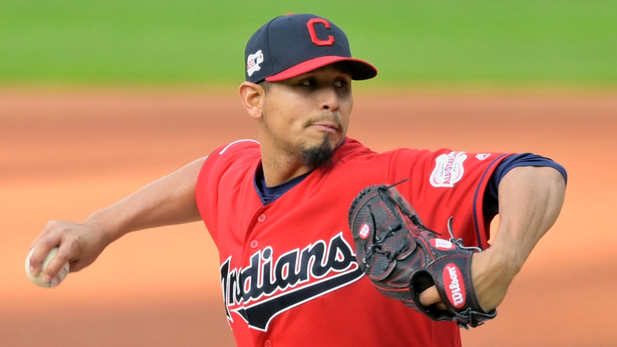 Apr 23, 2019; Cleveland, OH, USA; Cleveland Indians starting pitcher Carlos Carrasco (59) throws against the Miami Marlins in the third inning at Progressive Field.