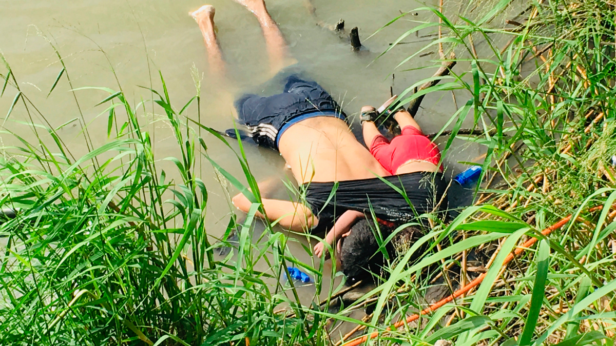 The bodies of Salvadoran migrant Oscar Alberto Martínez Ramírez and his nearly 2-year-old daughter Valeria lie on the bank of the Rio Grande in Matamoros, Mexico, Monday, June 24, 2019, after they drowned trying to cross the river to Brownsville, Texas. This photograph was first published in the Mexican newspaper La Jornada.