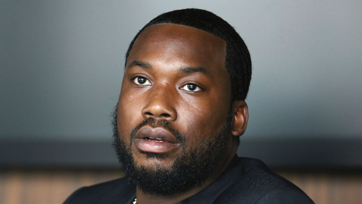 In this Tuesday, July 23, 2019 photo, Meek Mill makes an announcement of the launch of Dream Chasers record label in joint venture with Roc Nation, at the Roc Nation headquarters in New York.   A Pennsylvania appeals court has thrown out rapper Meek Mill's decade-old conviction in a drug and gun case. The unanimous three-judge opinion Wednesday grants the rapper born Robert Williams a new trial because of new evidence of alleged police corruption. (Photo by Greg Allen/Invision/AP)