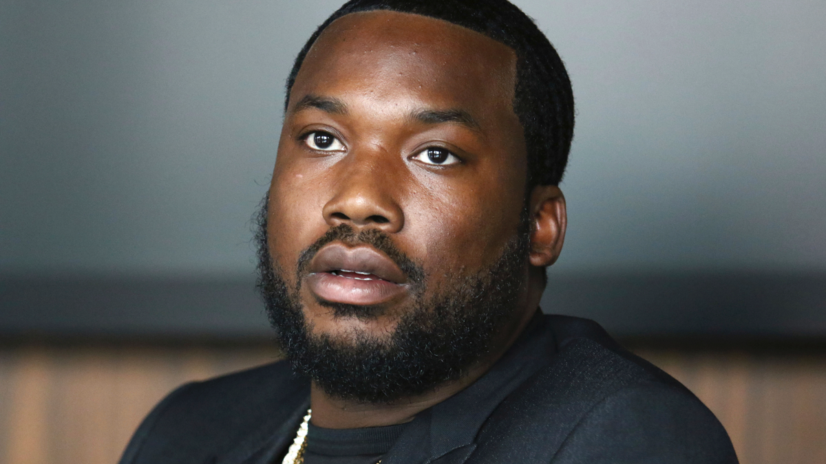 In this Tuesday, July 23, 2019 photo, Meek Mill makes an announcement of the launch of Dream Chasers record label in joint venture with Roc Nation, at the Roc Nation headquarters in New York.   A Pennsylvania appeals court has thrown out rapper Meek Mill's decade-old conviction in a drug and gun case. The unanimous three-judge opinion Wednesday grants the rapper born Robert Williams a new trial because of new evidence of alleged police corruption. (Photo by Greg Allen/Invision/AP)