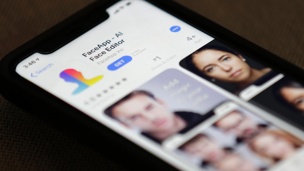 FaceApp is displayed on an iPhone Wednesday, July 17, 2019, in New York.  (AP Photo/Jenny Kane)