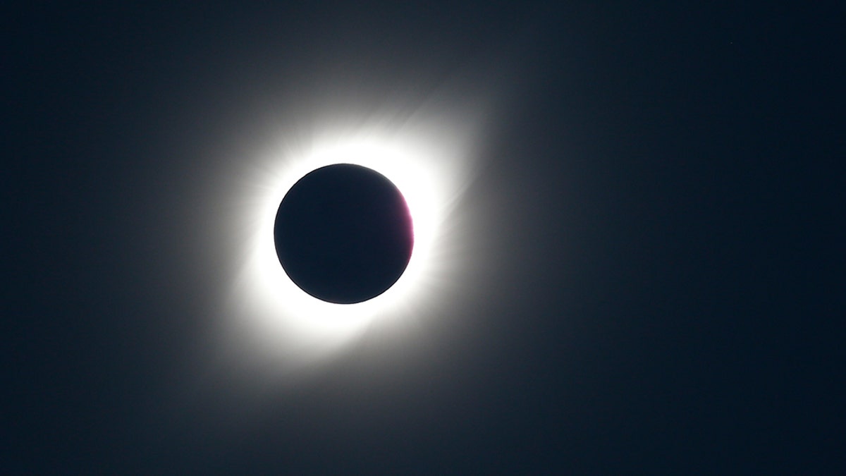 A solar eclipse observed at Coquimbo, Chile, on Tuesday. (REUTERS/Rodrigo Garrido)