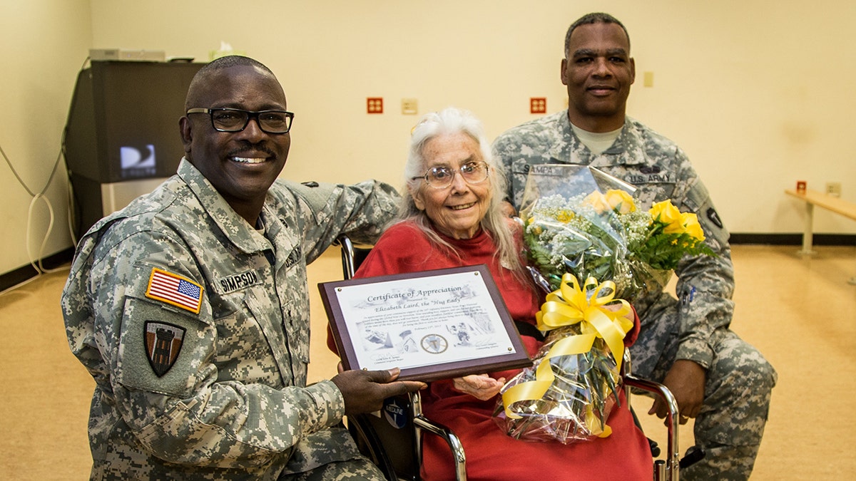 Maj. Gen. Lester Simpson, Elizabeth Laird and Command Sgt. Maj. John Sampa at Fort Hood’s Robert Gray Army Airfield in September 2015.