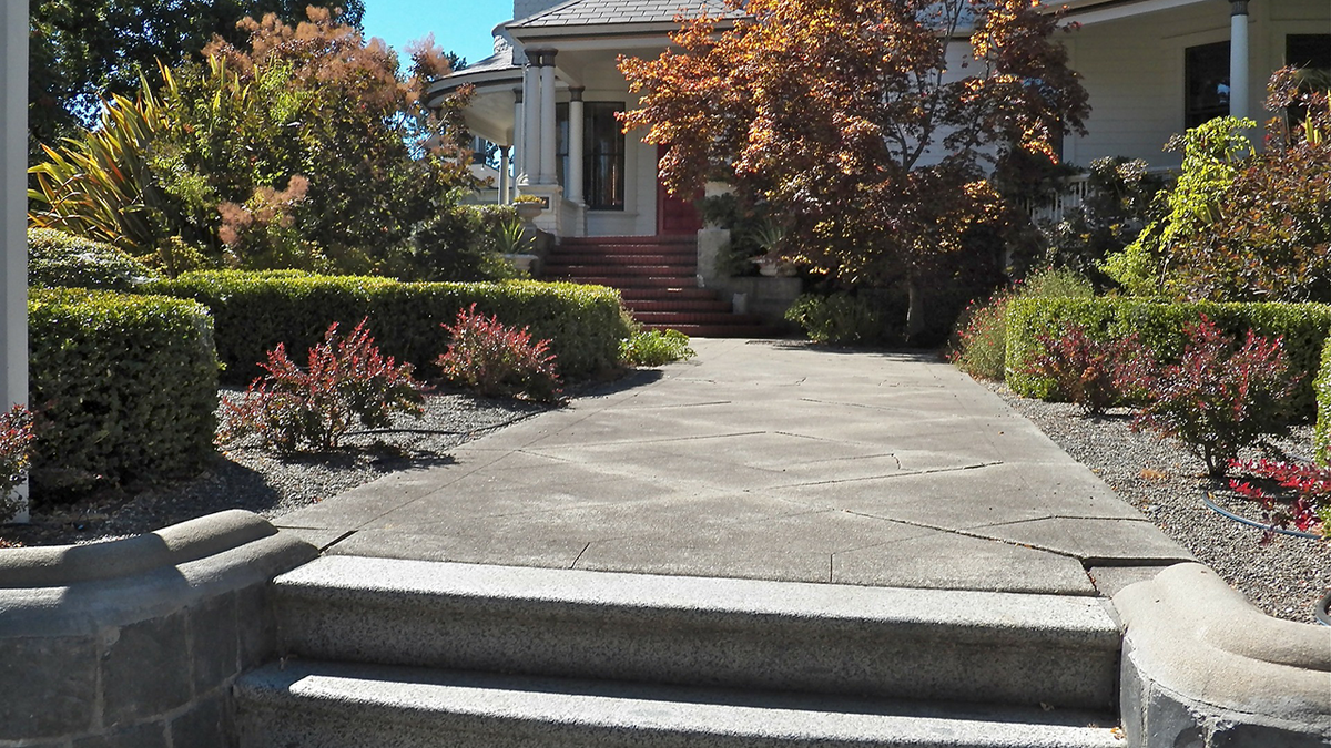 “Consider pressure-washing it at least once a month,” an expert advises. “It prevents wear and tear and quickly removes dirt to give your pathway a neat and clean look.”