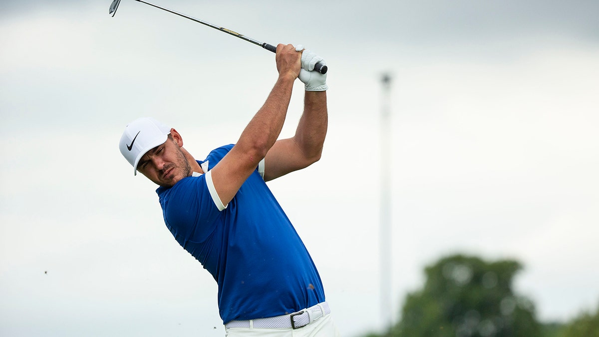 Brooks Koepka tees off on the fourth hole during the first round of the 3M Open golf tournament in Blaine, Minn., Thursday, July 4, 2019. (Alex Kormann/Star Tribune via AP)