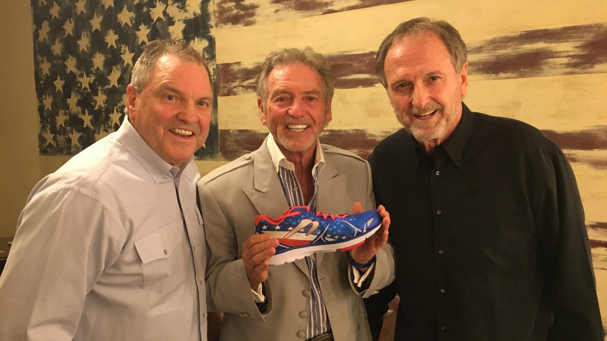 (L-R) Steve, Larry and Rudy Gatlin with their new sneaker. 