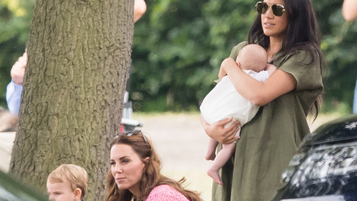Meghan, Duchess of Sussex and Archie Harrison, with Catherine, Duchess of Cambridge and Prince Louis