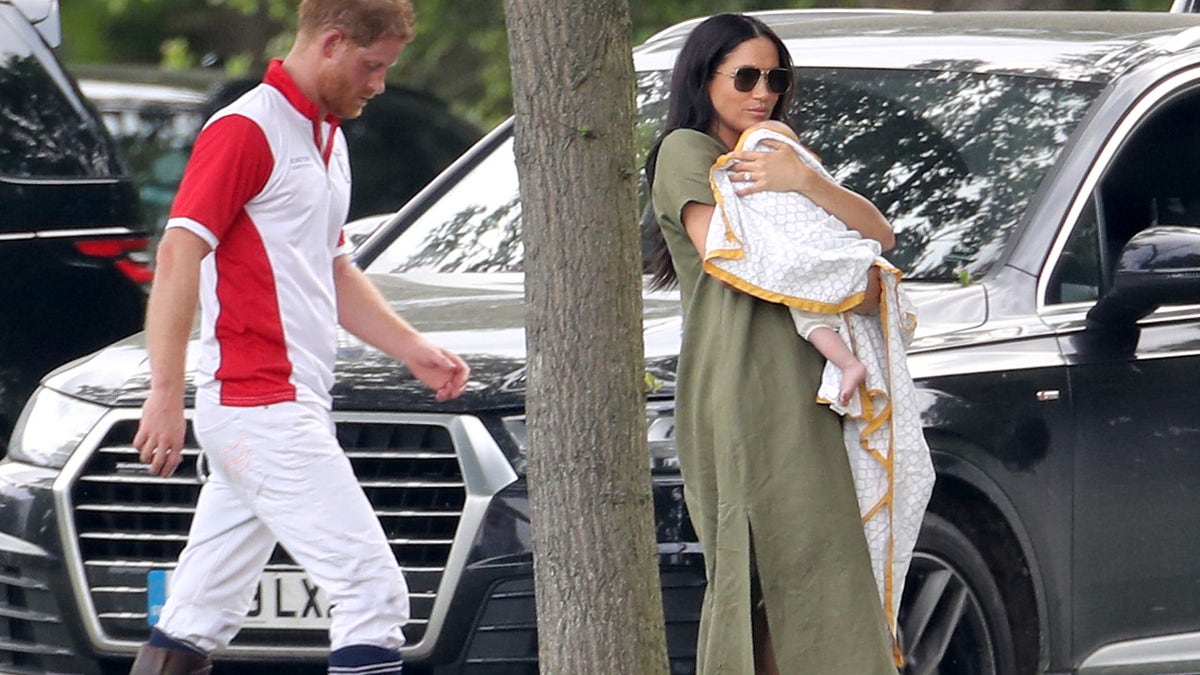 Prince Harry, Duke of Sussex, Meghan, Duchess of Sussex, and Archie Harrison attend The King Power Royal Charity Polo Day