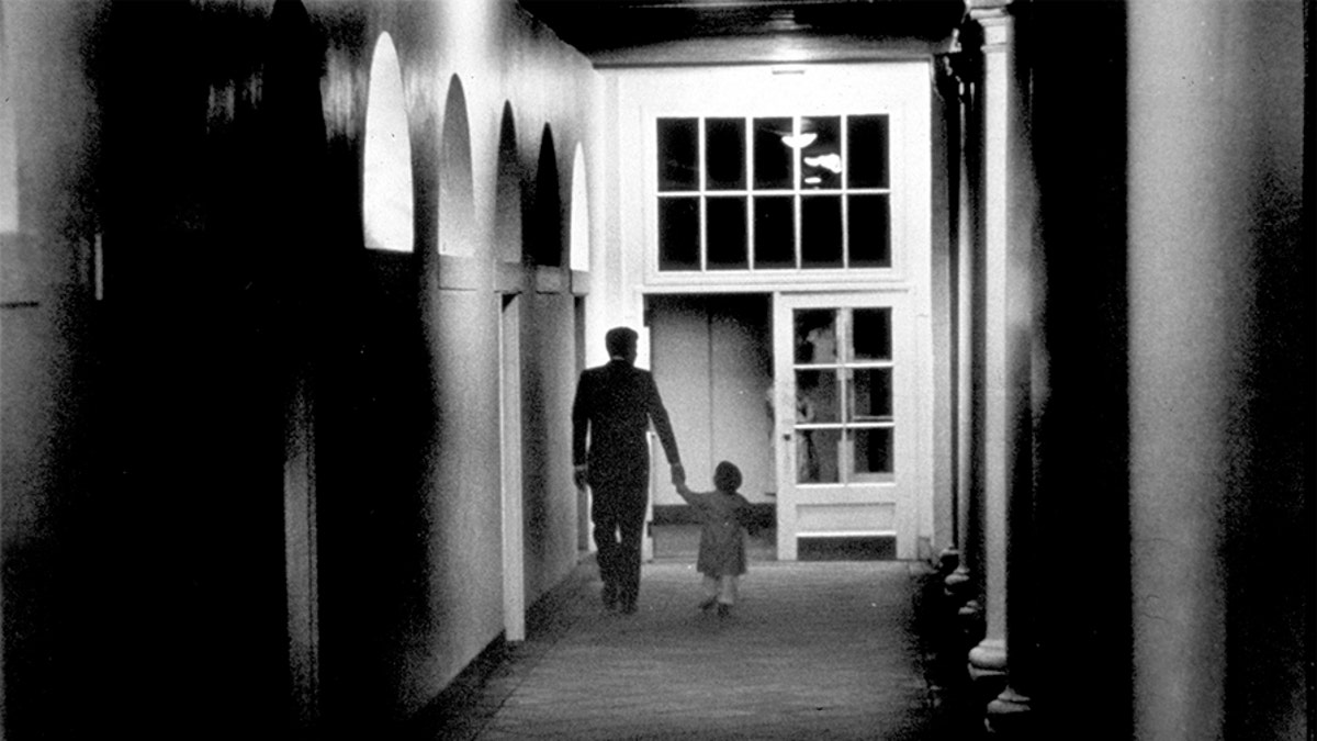 John Kennedy Jr. playing in the Oval Office at the White House, Washington, D.C., Oct. 15, 1963. (Photo by Liaison Agency/Getty)