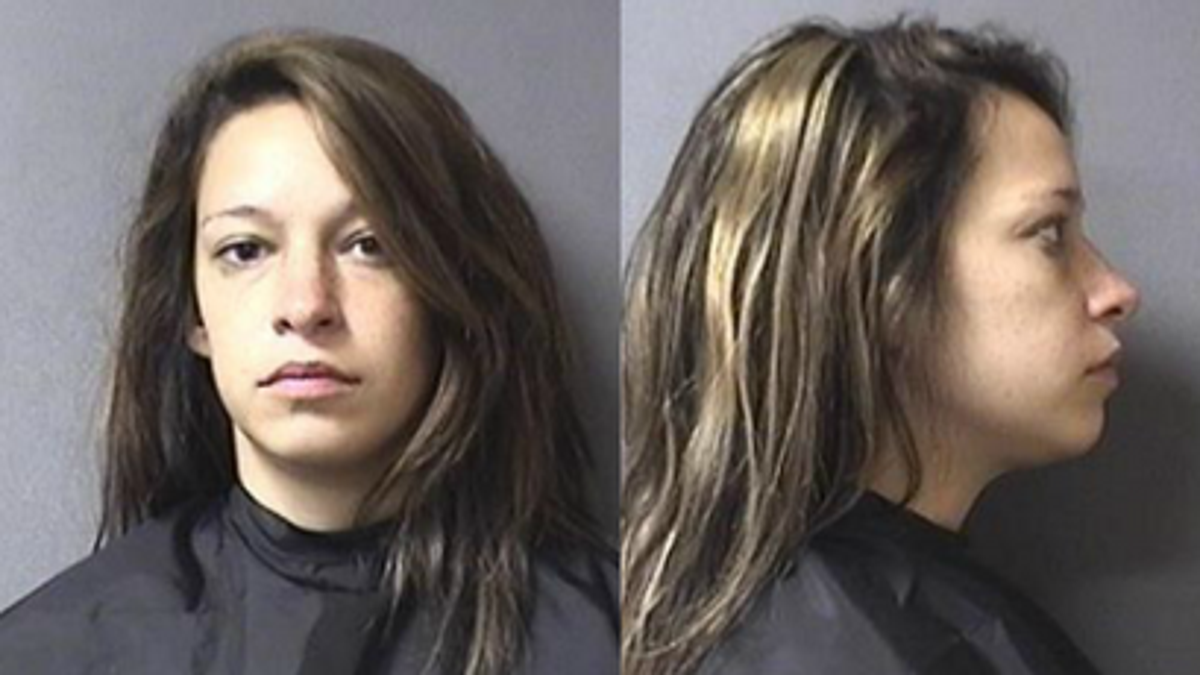 Jennifer K. Ost is accused of leaving her child in a hot car during a Department of Child Services interview in Indiana.