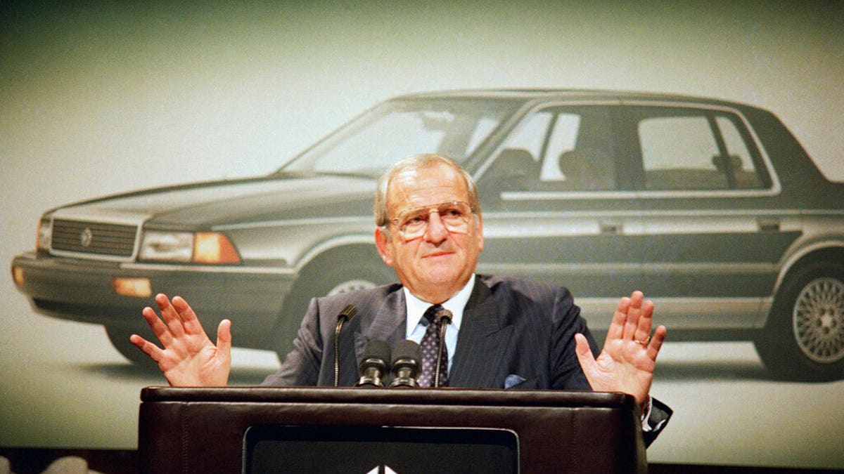 FILE - In this Feb. 2, 1989, file photo, Chrysler Corp. Chairman Lee Iacocca gestures while speaking about fourth quarter pre-tax earnings which are up 23.8 percent for the automaker at Grand Hyatt Hotel, New York. Former Chrysler CEO Iacocca, who became a folk hero for rescuing the company in the '80s, has died, former colleagues said Tuesday, July 2, 2019. He was 94. (AP Photo/Mario Cabrera, File)