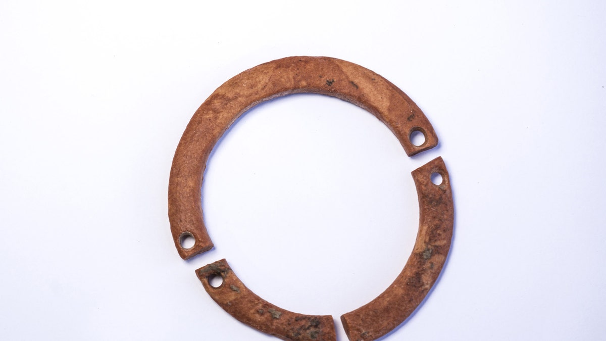 A bracelet found at the site. The size of the bracelets discovered indicates that they were probably given to children. (Photo: Yaniv Berman, Israel Antiquities Authority)