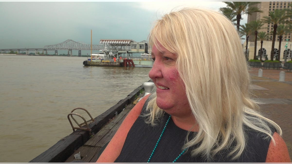 New Orleans resident Jena Smith looks out at the Mississippi River Wednesday. (Fox News/ Charles Watson)