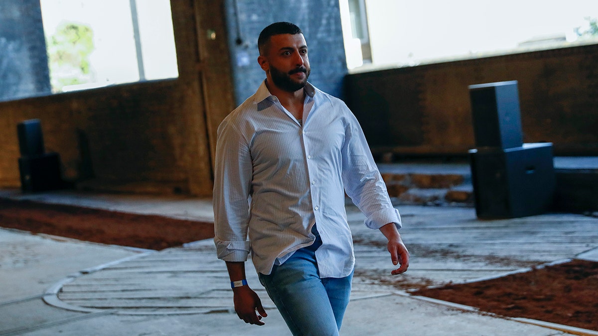 Khalid bin Sultan Al Qasimi walks the runway at the Qasimi show during London Fashion Week Men's June 2019 on June 08, 2019 in London, England.