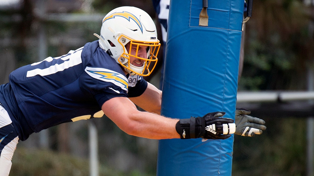 Los Angeles Chargers defensive end Joey Bosa runs a drill during an NFL football training camp in Costa Mesa, Calif., Monday, July 29, 2019. (AP Photo/Kyusung Gong)