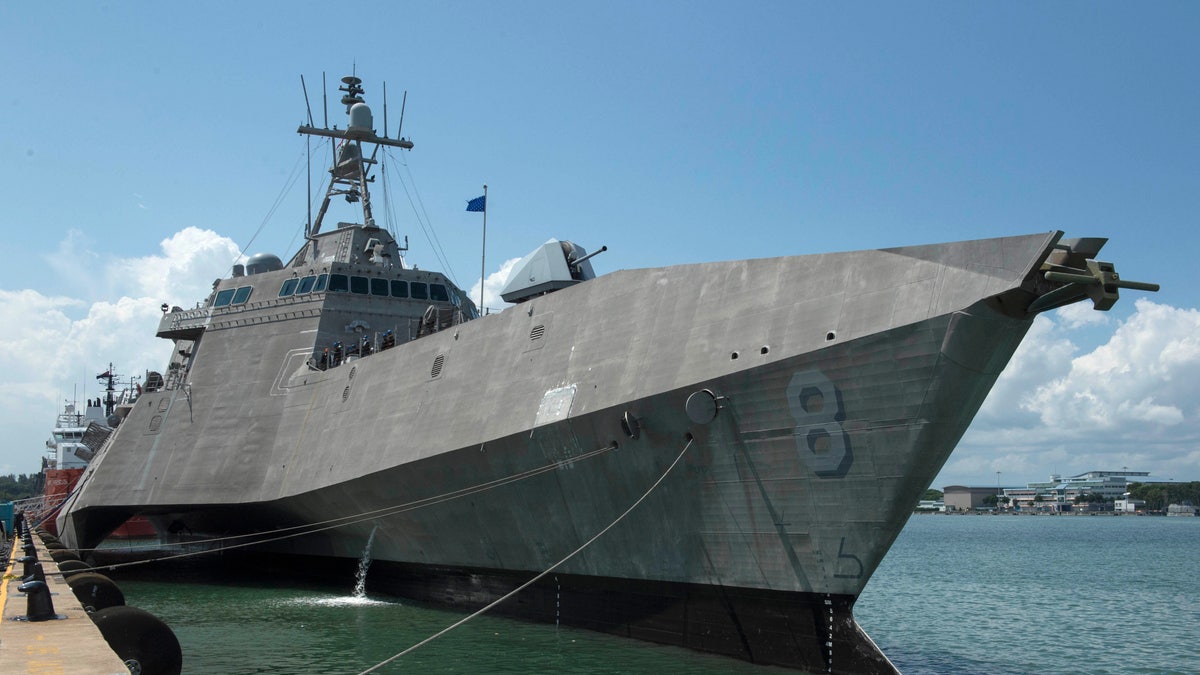 The Independence-variant littoral combat ship USS Montgomery (LCS 8) sits pierside at Changi Naval Base, Singapore, in 2019, after arriving for a rotational deployment. 