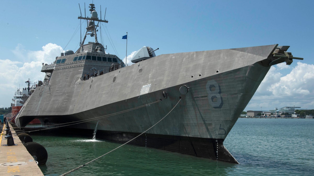 The Independence-variant littoral combat ship USS Montgomery (LCS 8) sits pierside at Changi Naval Base, Singapore, in 2019, after arriving for a rotational deployment. 