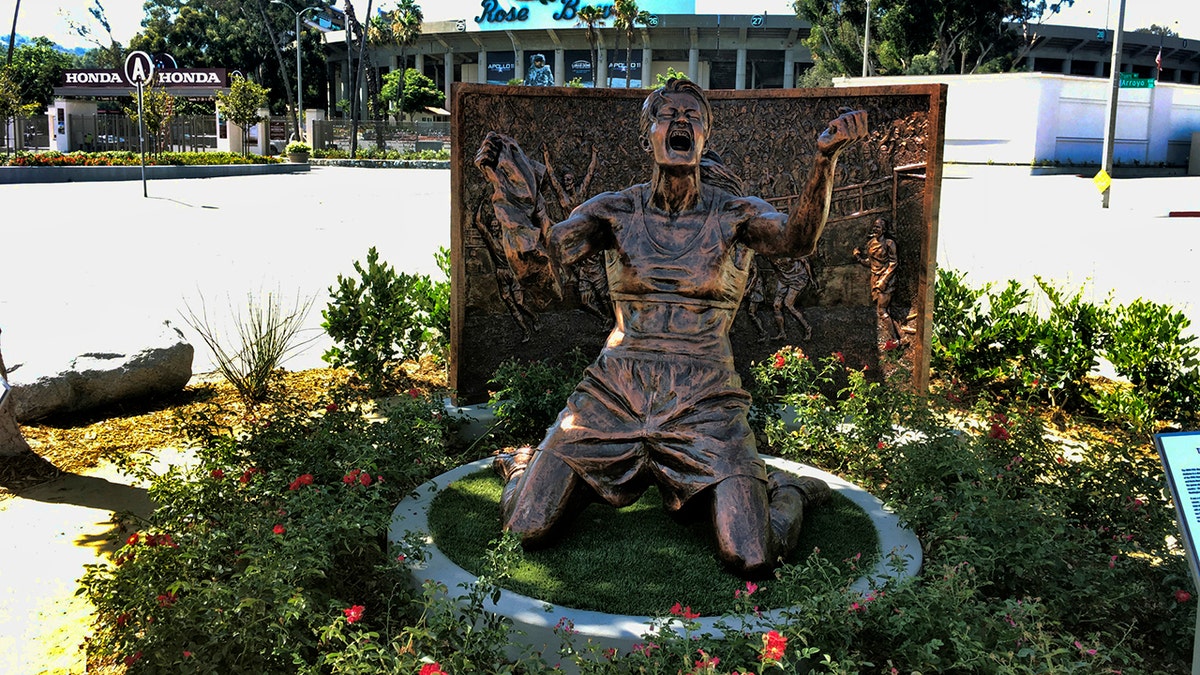 A statue capturing Brandi Chastain's iconic reaction to scoring the U.S. team's winning goal in the 1999 Women's World Cup, is shown after being unveiled outside the Rose Bowl in Pasadena, Calif., Wednesday, July 10, 2019. (AP Photo/John Antczak)