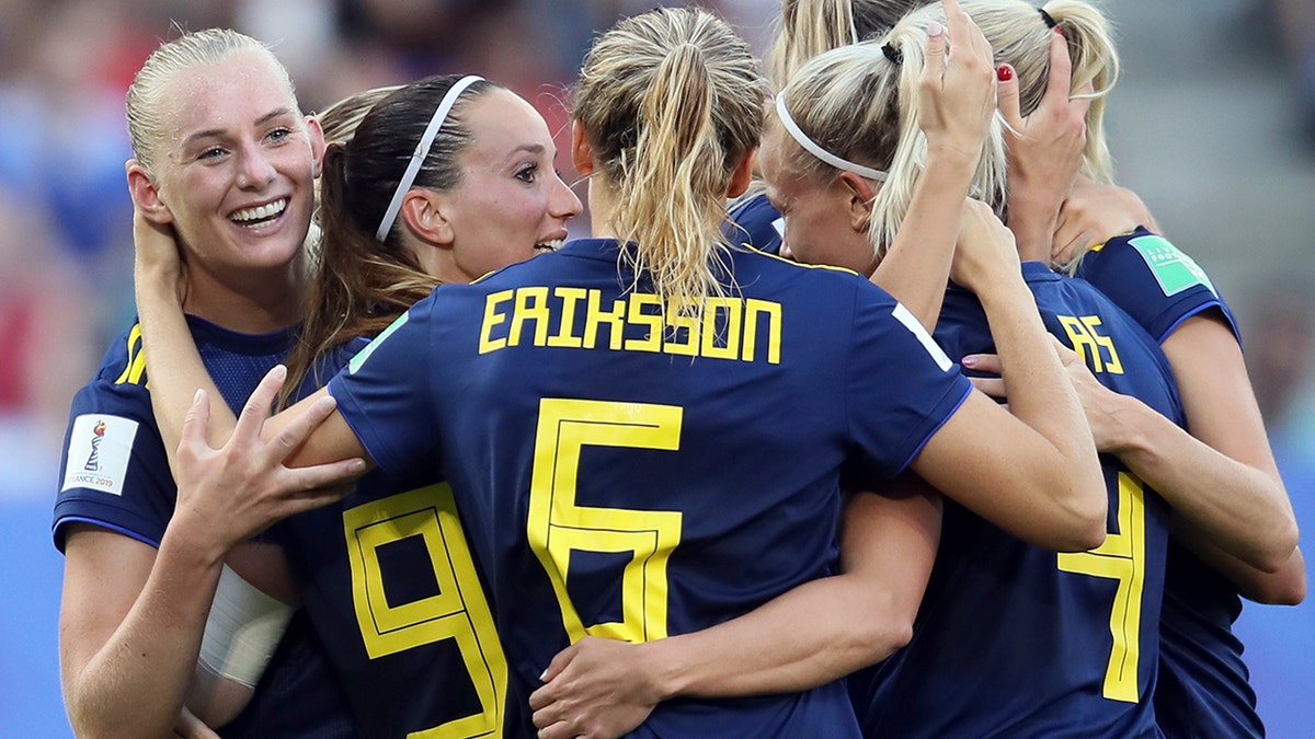 Sweden's Stina Blackstenius, left, with teammates celebrates after scoring her side's second goal during the of the Women's World Cup quarterfinal soccer match between Germany and Sweden at Roazhon Park in Rennes, France, Saturday, June 29, 2019. (AP Photo/David Vincent)