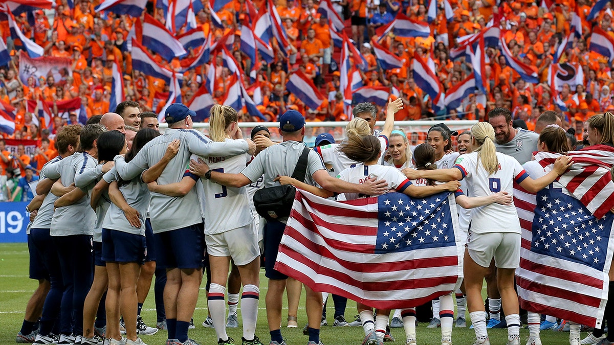 Members of the US team celebrate at the end of the Women's World Cup final soccer match between US and The Netherlands at the Stade de Lyon in Decines, outside Lyon, France, Sunday, July 7, 2019. US won 2:0. (AP Photo/David Vincent)
