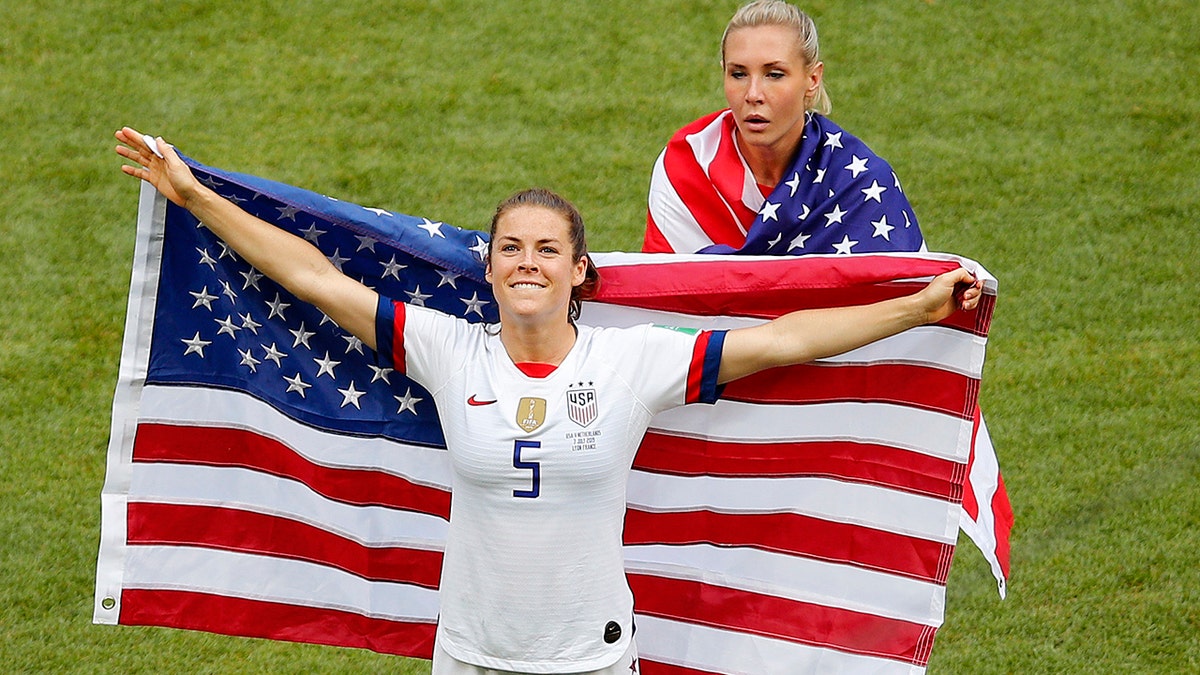 United States' Kelley O Hara celebrates winning the Women's World Cup final soccer match between US and The Netherlands at the Stade de Lyon in Decines, outside Lyon, France, Sunday, July 7, 2019. (AP Photo/Francois Mori)