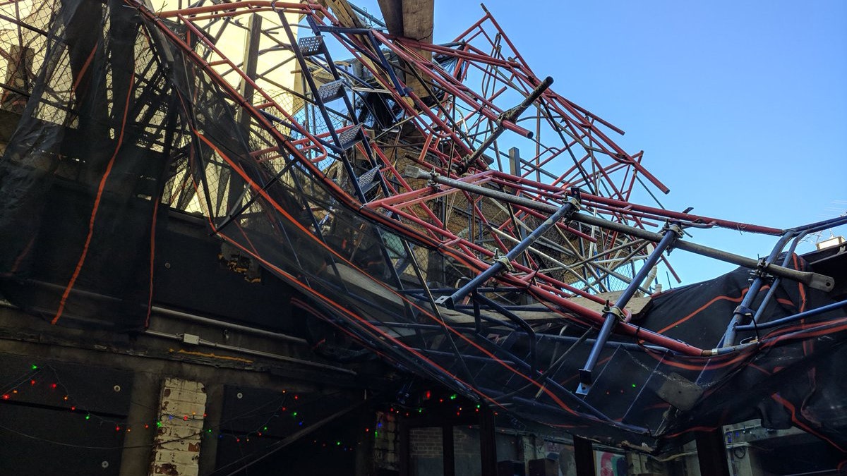 Fire officials said three people were hurt after scaffolding blew off the top of a 12-story building in Brooklyn. (New York City Fire Department)