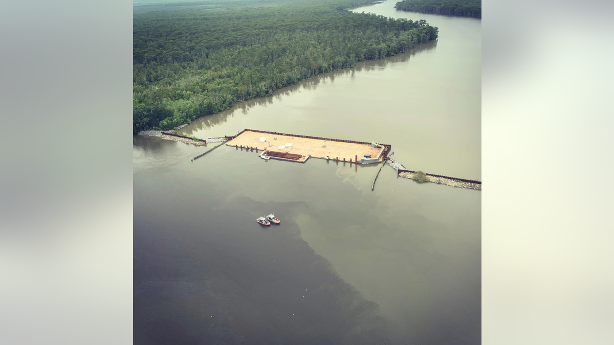 A 400-foot-long sunken barge in Bayou Chene is credited with sparing Assumption Parish from flooding caused by Hurricane Barry.