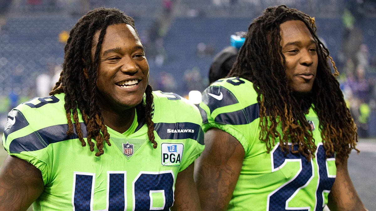 Seattle Seahawks brothers Shaquem Griffin (49) and Shaquill Griffin (26) walk off the field together during a game between the Minnesota Vikings and the Seattle Seahawks. (Photo by Christopher Mast/Icon Sportswire via Getty Images)
