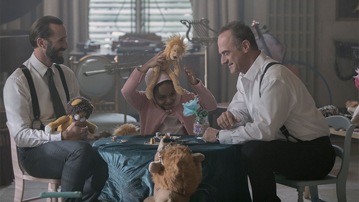 The Handmaid's Tale -- "Household" - Episode 306 -- June accompanies the Waterfords to Washington D.C., where a powerful family offers a glimpse of the future of Gilead. June makes an important connection as she attempts to protect Nichole. Fred (Joseph Fiennes), Polly (Maria Nash), and Winslow (Christopher Meloni) shown. (Photo by Jasper Savage/Hulu)