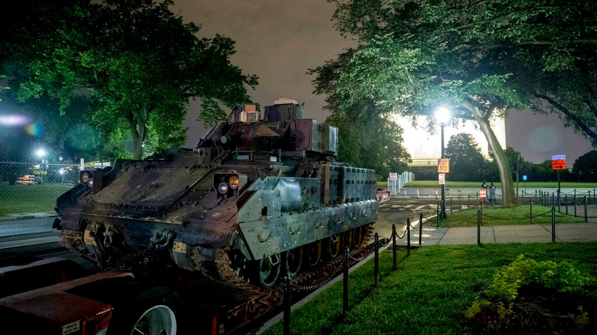 One of two Bradley Fighting Vehicles is parked next to the Lincoln Memorial before President Donald Trump's "Salute to America," event honoring service branches on Independence Day, Tuesday, July 2, 2019, in Washington. Trump is promising military tanks along with "Incredible Flyovers & biggest ever Fireworks!" for the Fourth of July. (AP Photo/Andrew Harnik)