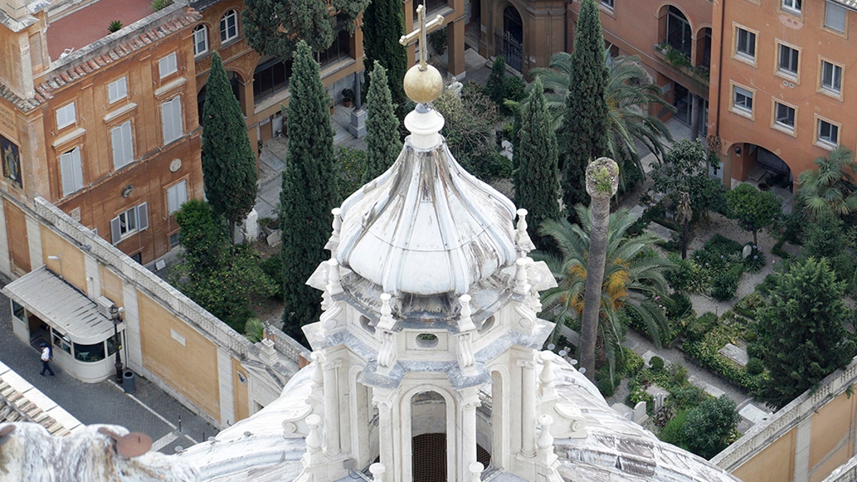 FILE - This Wednesday, July 10, 2019 file photo shows the view of the Teutonic Cemetery inside the Vatican. After opening a pair of tombs inside the cemetery after further investigation into the case of the 15-year-old daughter of a Vatican employee, Emanuela Orlandi, who disappeared in 1983 only to find that the tombs were empty, the Vatican said Saturday, July, 13, 2019, it discovered two ossuaries under a manhole that are now the subject of forensic investigation. (AP Photo/Gregorio Borgia)