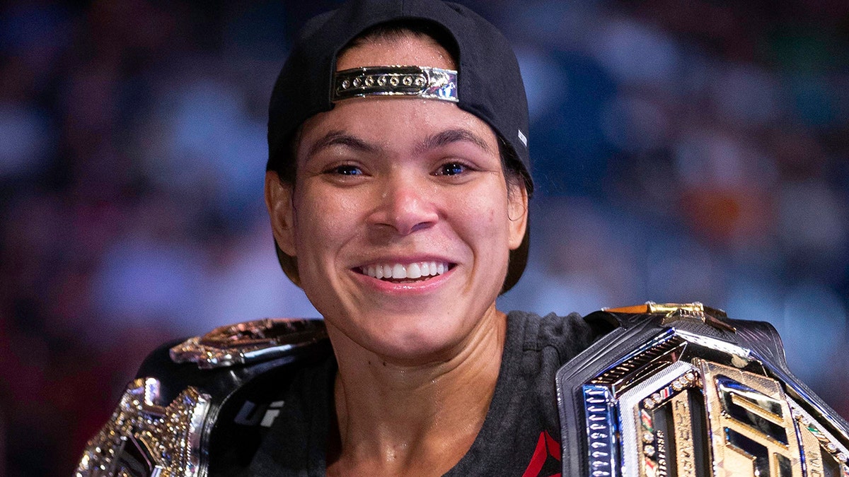 Amanda Nunes smiles after victory over Holly Holm during their women's bantamweight mixed martial arts title bout at UFC 239 on Saturday, July 6, 2019, in Las Vegas. Nunes won by first-round knockout. (AP Photo/Eric Jamison)